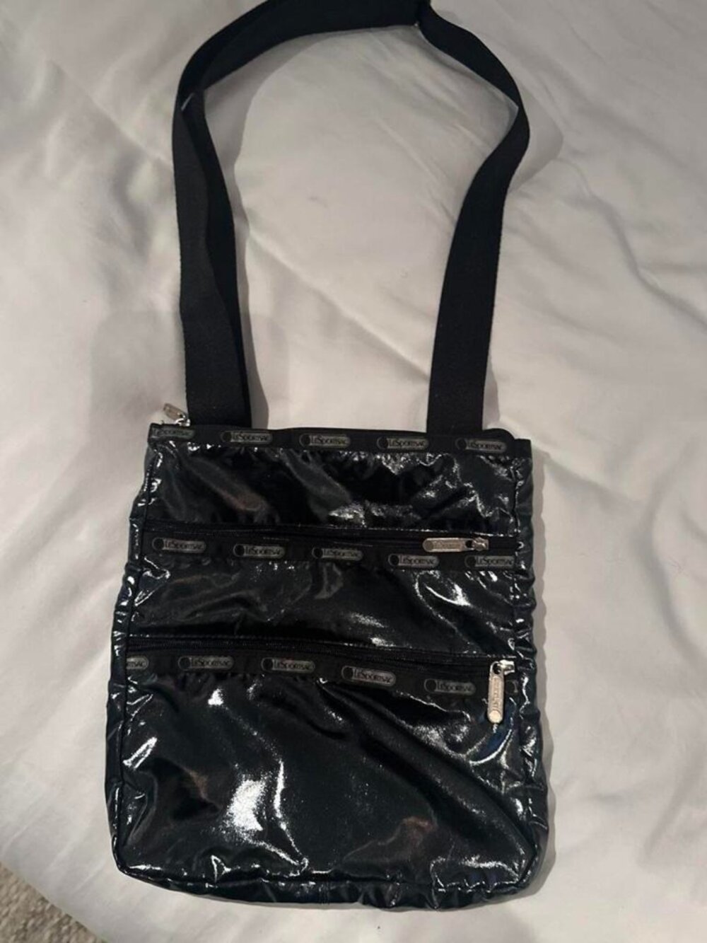 LeSportsac Black Patent Leather Crossbody Bag Silver Logo Pattern